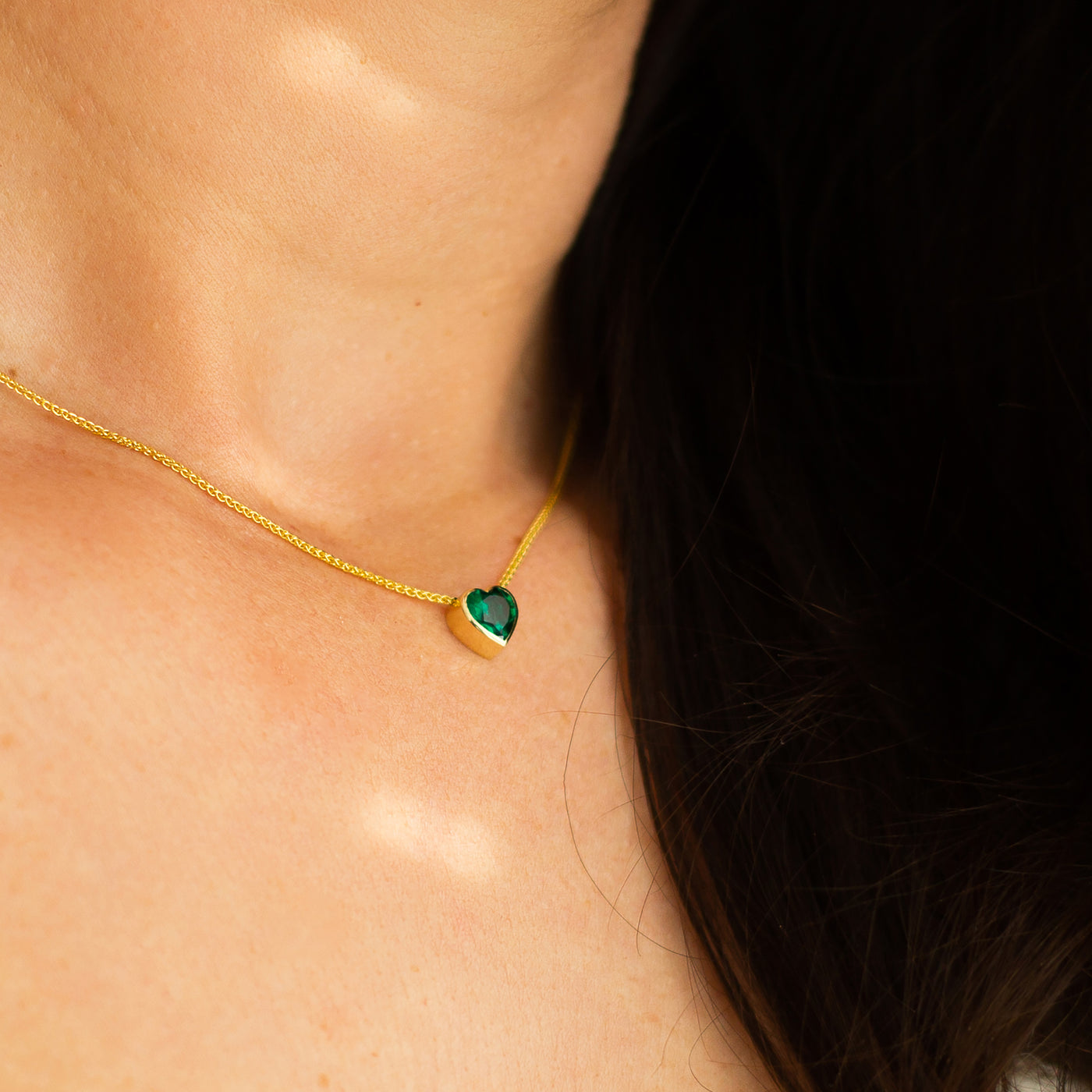 Express your love with the delicate beauty of this Emerald Heart 14K necklace. This stunning choker features a green gemstone pendant, in a solid gold 14K necklace. the perfect anniversary gift for may birthstone.