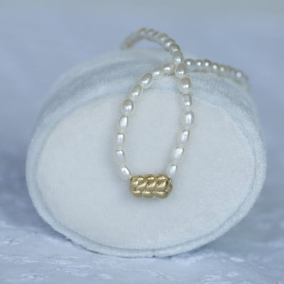 closeup of a challah necklace with freshwater pearls chain