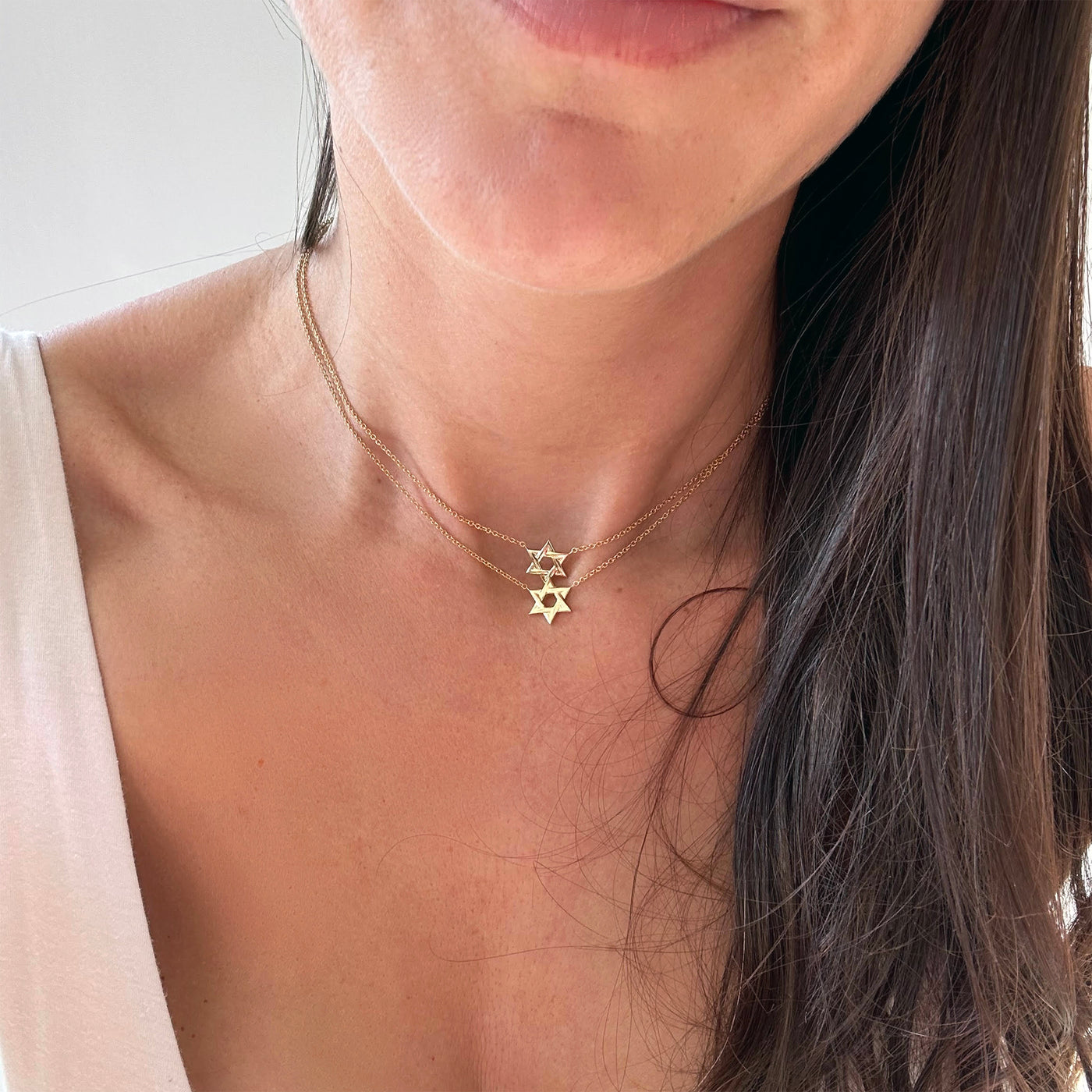 women wearing a classic solid gold Star Of David 14K Necklace