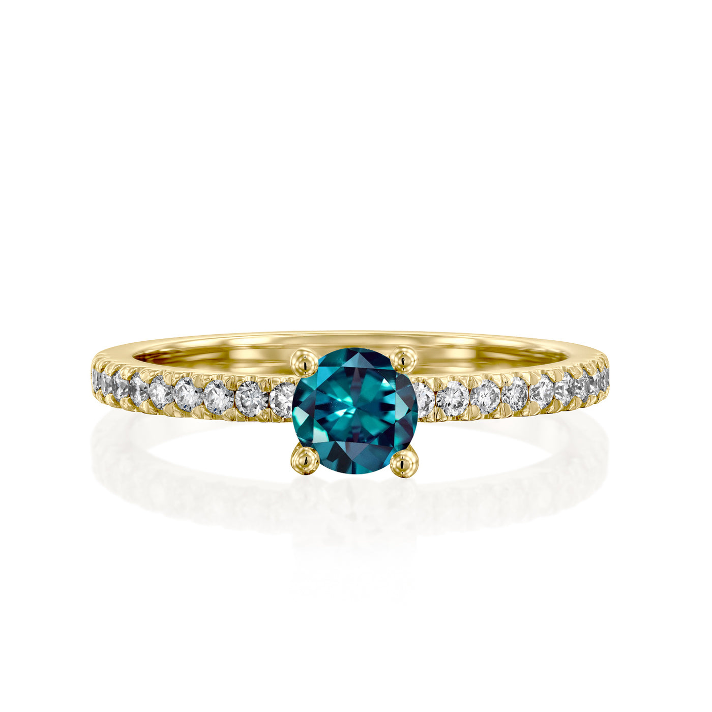 Gold ring with a green gemstone and smaller diamonds on a white background