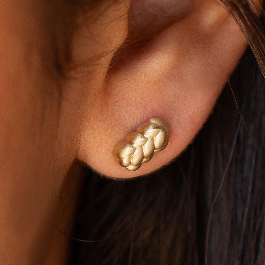 women wearing large knot earrings,  14K Gold Challah Studs