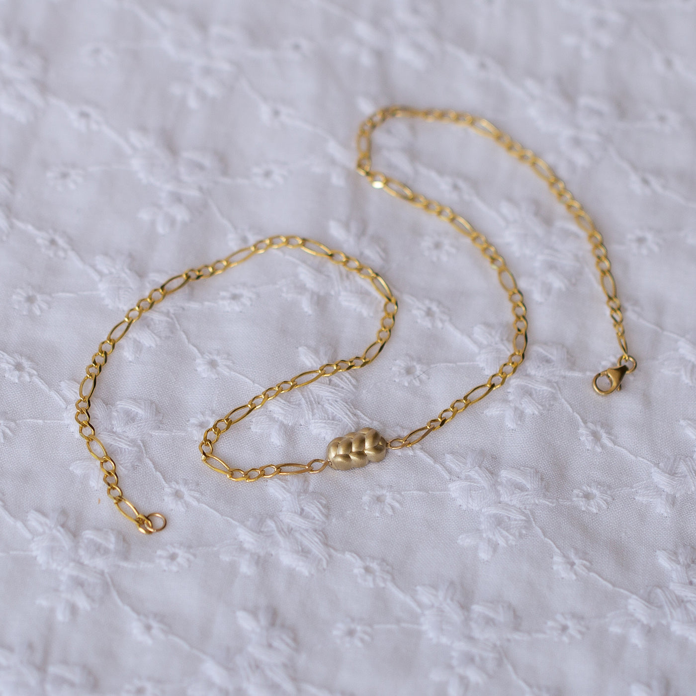 closeup of 14K yellow Gold Challah Necklace, with an edgy chain