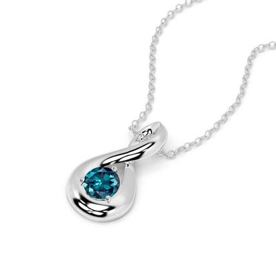 white gold alexandrite necklace on a white background