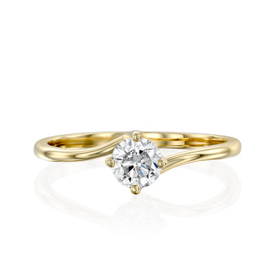 This is a unique twist engagement diamond ring, set in a 14K/18K solid gold band, the perfect dainty classic Solitaire bridal ring.