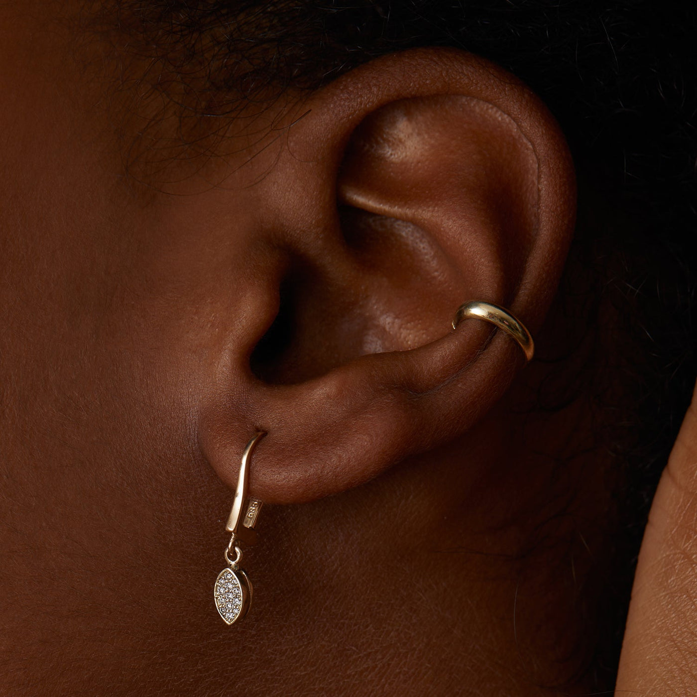 This unique 14K gold piercing is the perfect non-pierced cartilage ear cuff, a beautiful solid gold ear wrap.