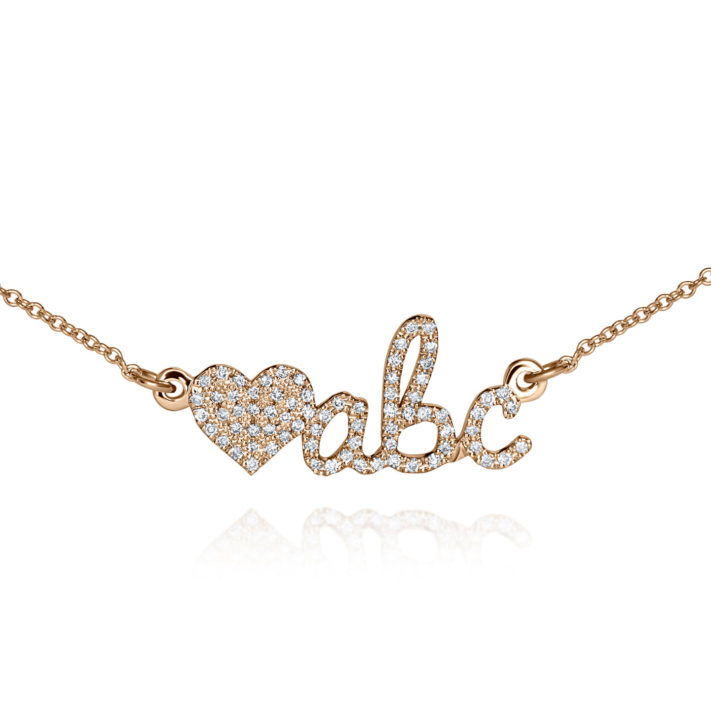 dainty custom name necklace in 14k rose gold, set with diamonds, with a diamond heart, the perfect push present for new mom